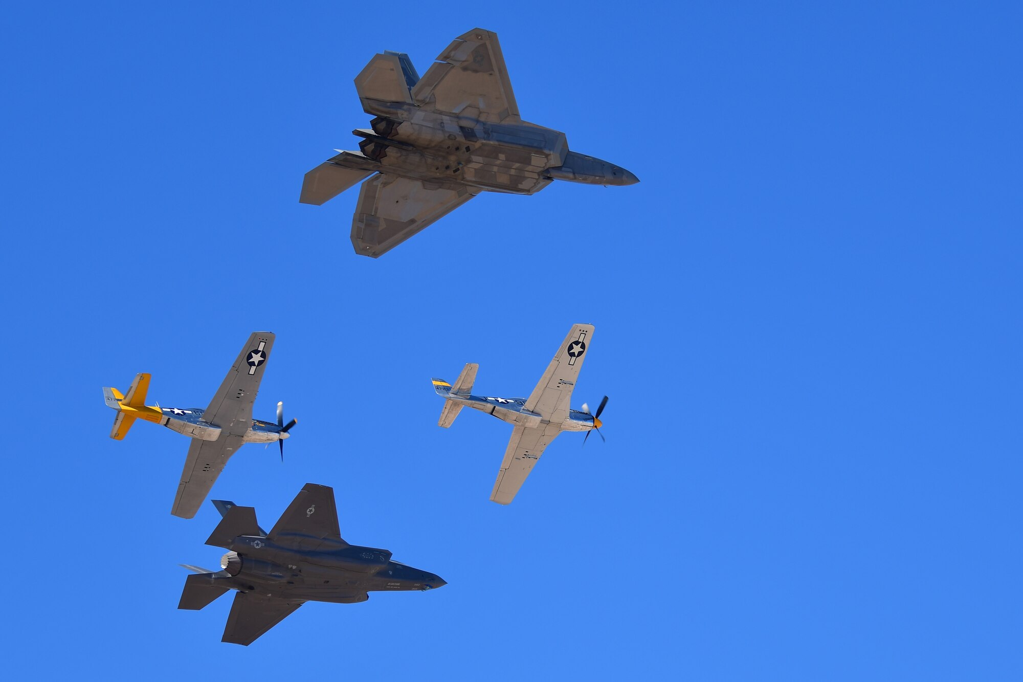 Four planes flying in formation.