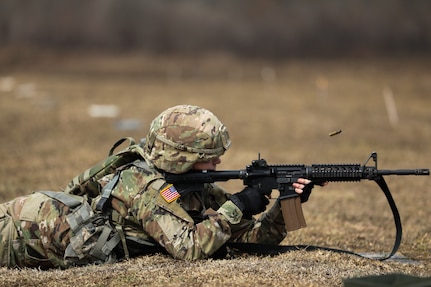 An Oklahoma Army National Guard Soldier shoots targets during a weapons skills challenge at the Best Warrior Competition at Camp Gruber Training Center, Oklahoma, March 4, 2022. (Oklahoma National Guard photo by Spc. Danielle Rayon)