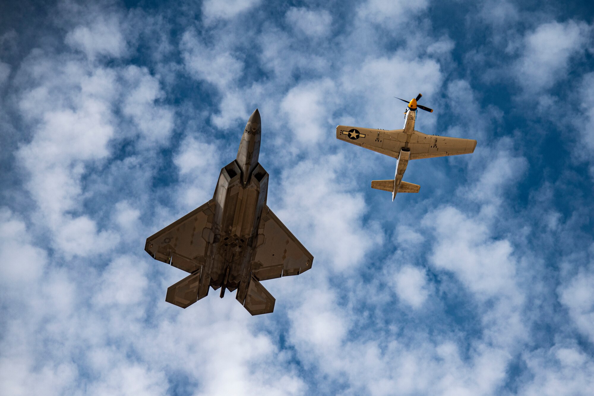 Two planes flying in formation.