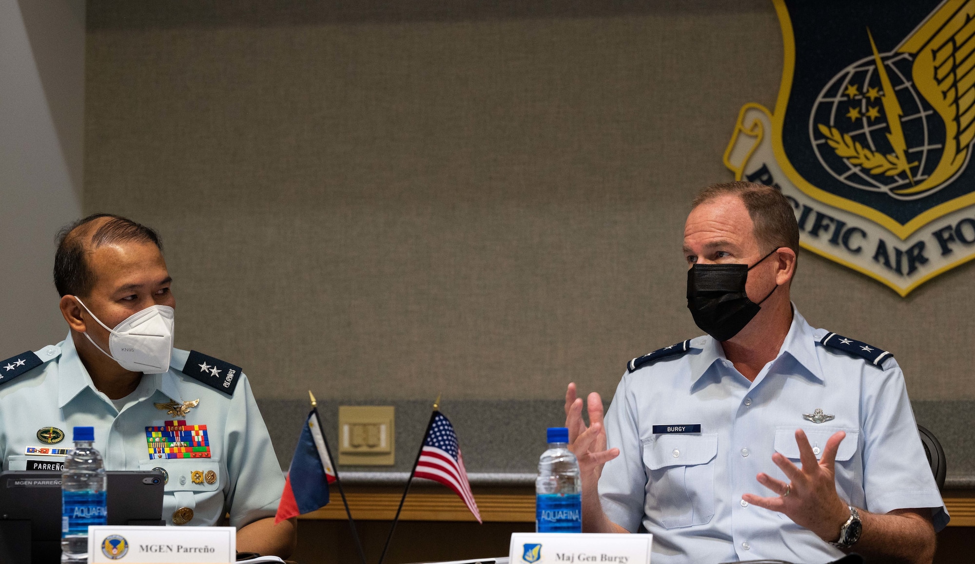 Philippine Air Force Maj. Gen. Stephen P. Parreño, Chief of Air Staff, Philippine Air Force, listens as U.S. Air Force Maj. Gen. David Burgy, Air National Guard Assistant to the Commander, Pacific Air Forces, gives remarks during the 10th Airman-to-Airman Talks between the two air forces, Joint Base Pearl Harbor-Hickam, Hawaii, Feb. 15, 2022. The talks provide an avenue to develop interoperability, foster military-to-military relations and improve bilateral cooperation. (U.S. Air Force photo by Tech. Sgt. Hailey Haux)