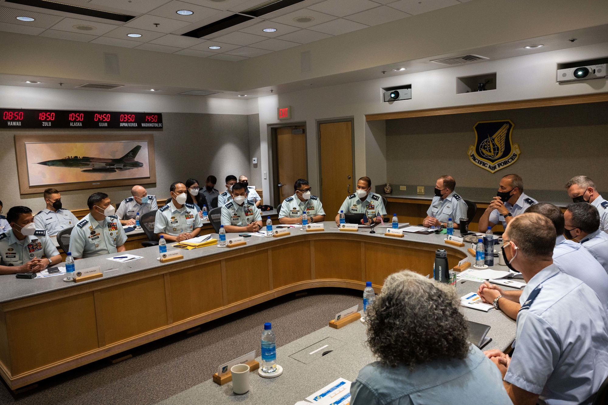 Philippine Air Force airmen introduce themselves during the 10th Airman-to-Airman Talks between the two air forces, Joint Base Pearl Harbor-Hickam, Hawaii, Feb. 15, 2022. During the week-long Airman-to-Airman engagement, members of the Philippine Air Force received a historical tour of Joint Base Pearl Harbor-Hickam as well as tours of Wheeler Army Airfield, Mount Ka’ala Radar Facility, USS Arizona Memorial and the Pacific Aviation Museum, giving them more insight as to how the base and its surrounding facilities play a role in the security and stability of the Indo-Pacific. (U.S. Air Force photo by Tech. Sgt. Hailey Haux)