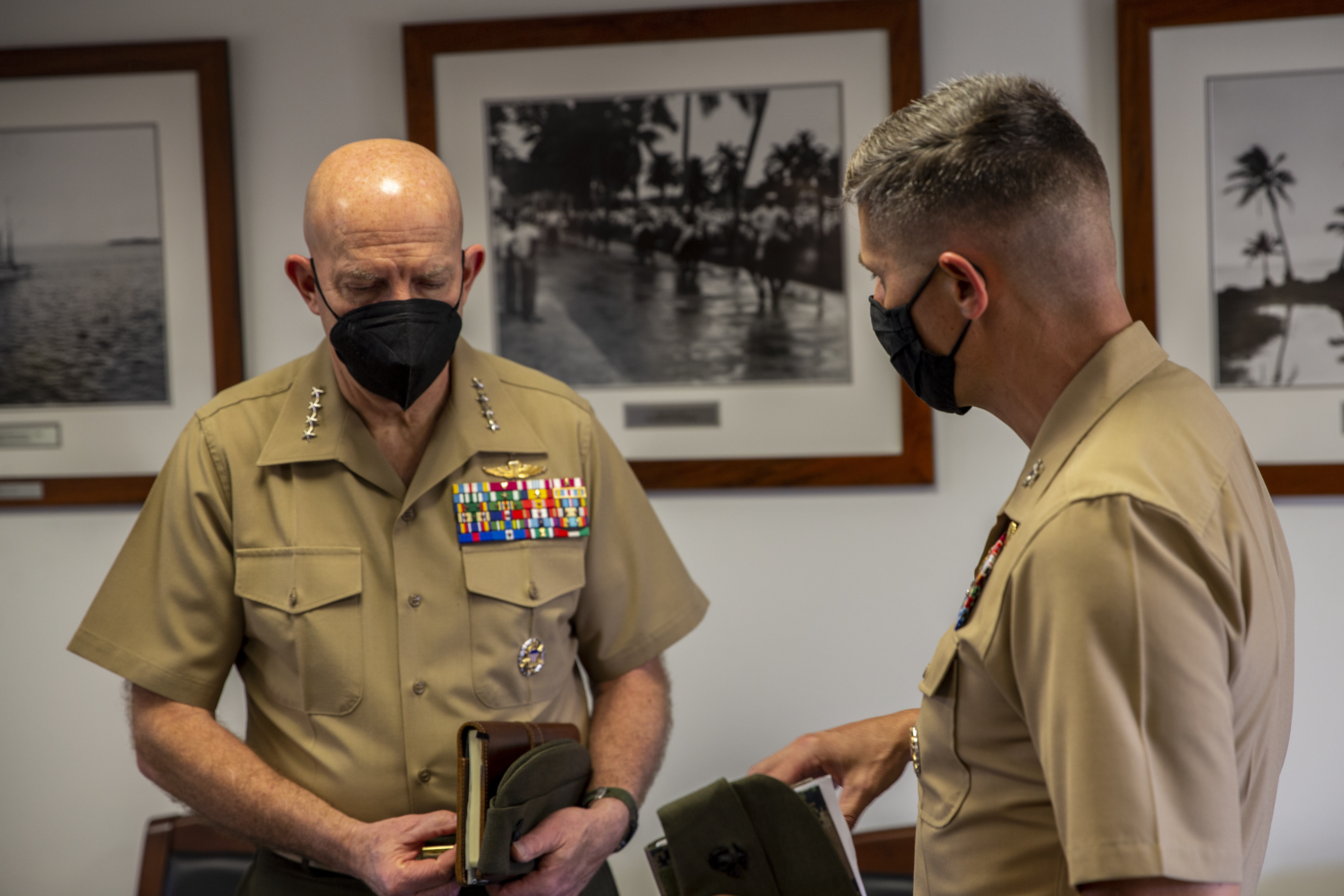 U.S. Marine Corps Col. Christopher Bopp, the Marine Corps Base (MCB) Camp Blaz commanding officer, right, speaks with the 38th Commandant of the Marine Corps, Gen. David H. Berger.