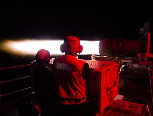 viation Machinist's Mate 2nd Class Bonner Martinez and Aviation Machinist's Mate Airman Jackelin Bowden observe the operation of an F414 jet engine aboard the aircraft carrier USS George H. W. Bush (CVN 77) during Tailored Ship's Training Availability/Final Evaluation Problem (TSTA/FEP),