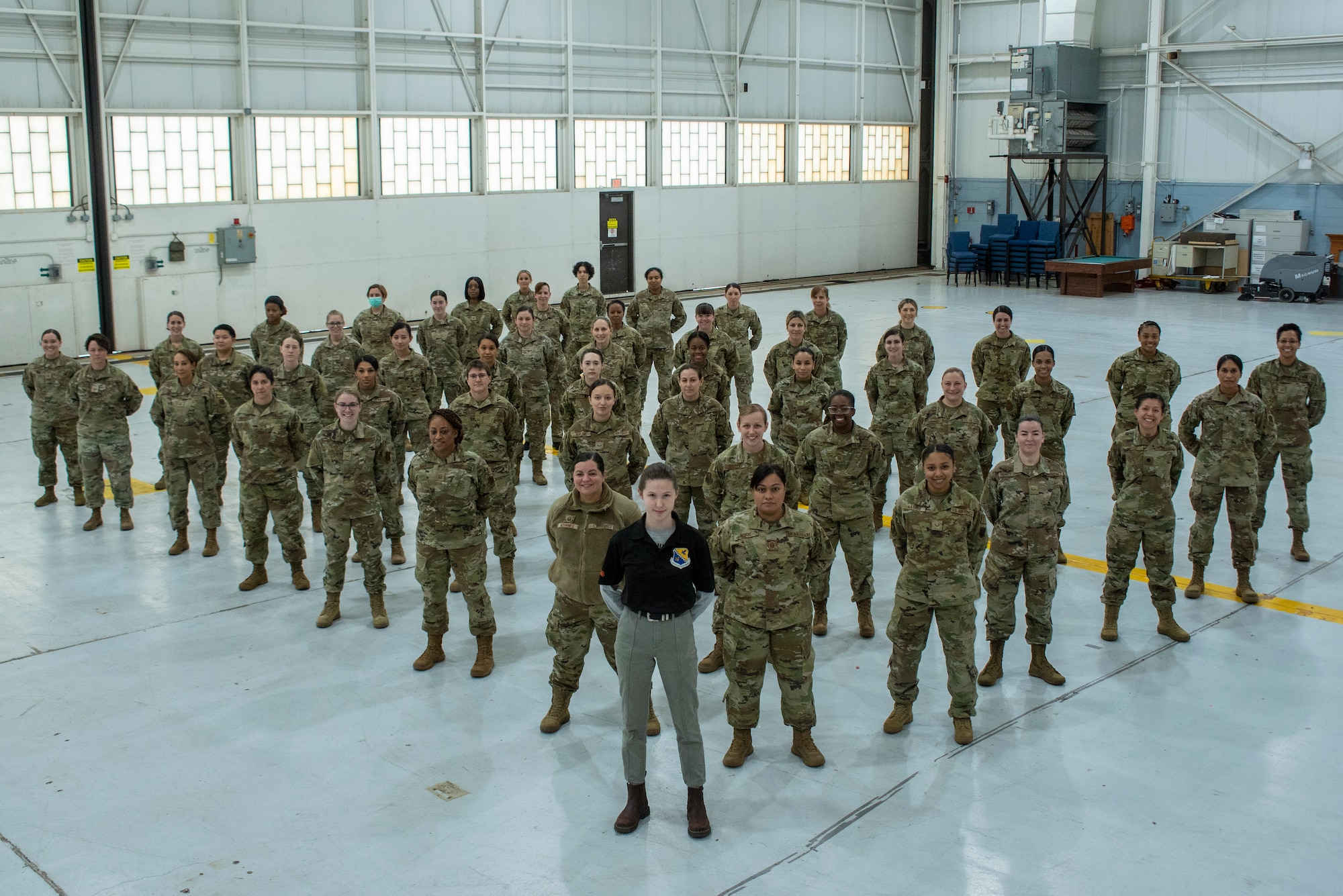 A group of Air National Guard women pose for a photo in uniform.