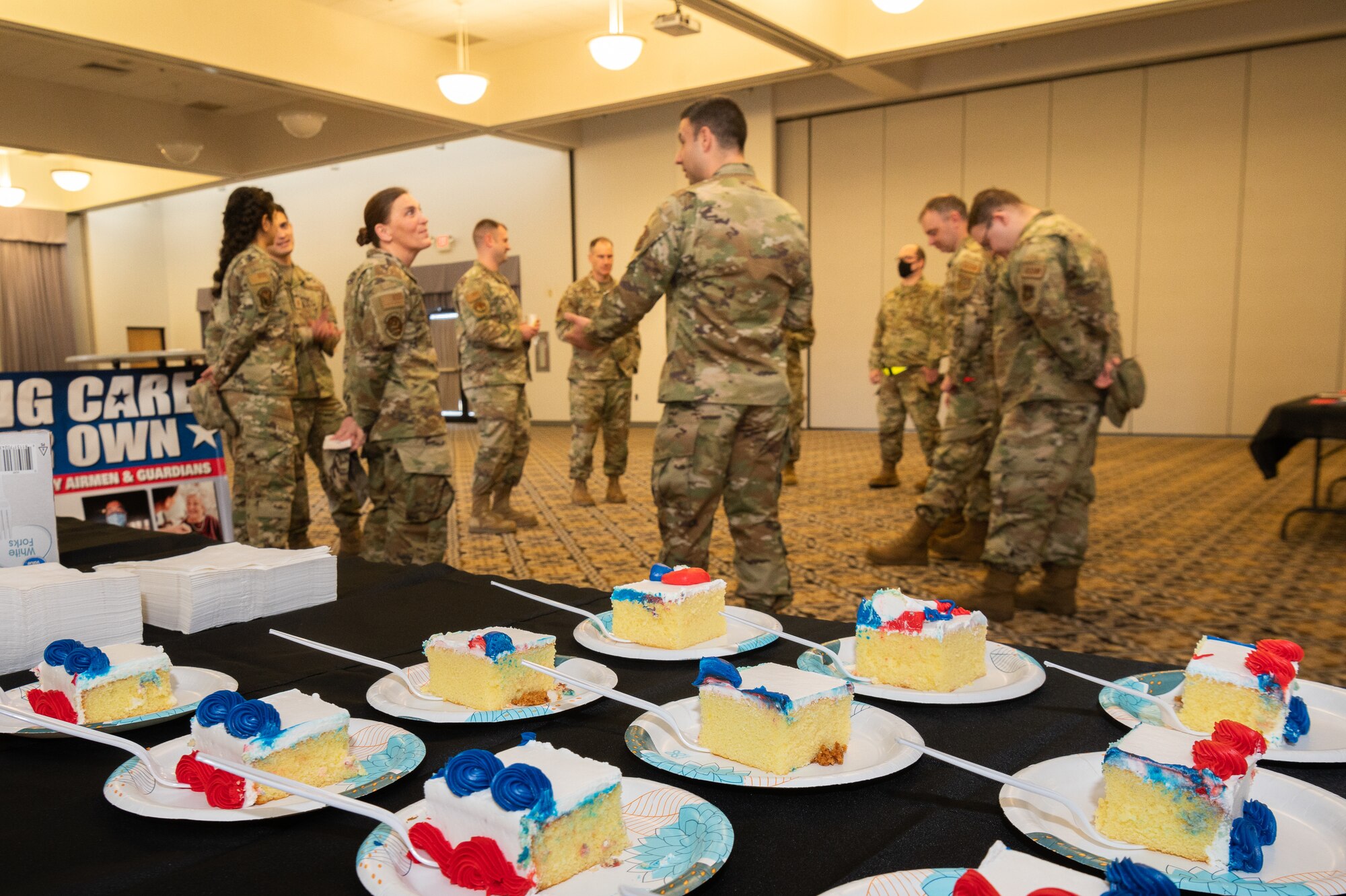Team Dover Airmen enjoy refreshments at the 2022 Air Force Assistance Fund Kickoff event at Dover Air Force Base, Delaware, March 7, 2022. Airmen who wish to donate can reach out to their unit program officer.  (U.S. Air Force photo by Mauricio Campino)
