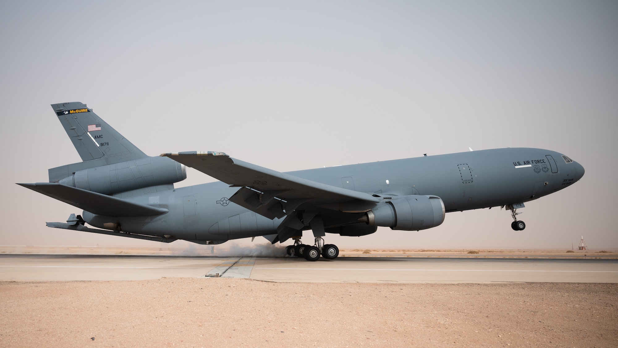 A U.S. Air Force KC-10 Extender assigned to the 908th Expeditionary Air Refueling Squadron lands at Prince Sultan Air Base, Kingdom of Saudi Arabia, March 6, 2022. The KC-10 is an advanced tanker and cargo aircraft designed to provide increased global mobility for U.S. armed forces. (U.S. Air Force photo by Senior Airman Jacob B. Wrightsman)