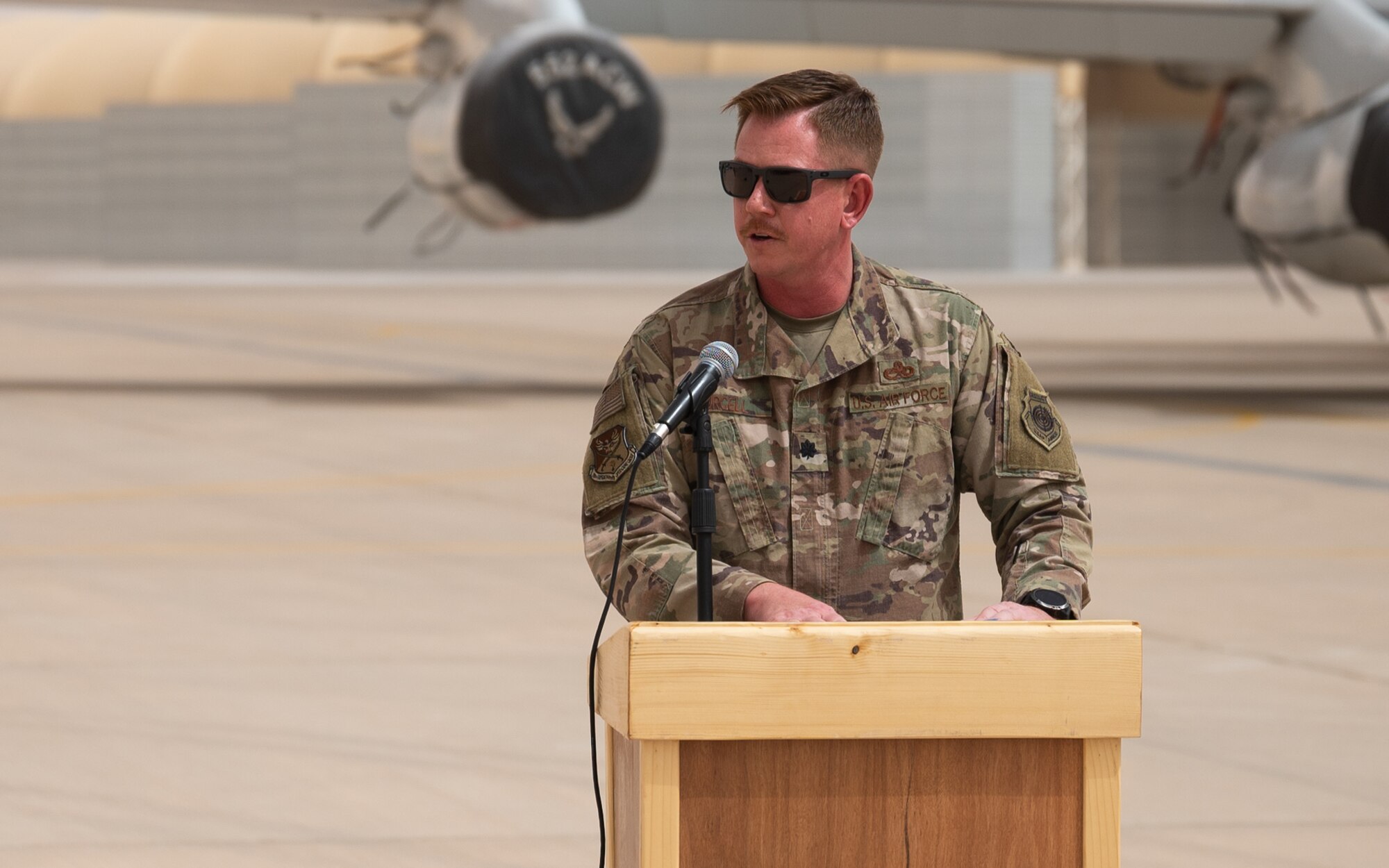 U.S. Air Force Lt. Col. Jason Purcell, incoming 378th Expeditionary Aircraft Maintenance Squadron commander, makes remarks during the 378th EAMXS unit activation ceremony at Prince Sultan Air Base, Kingdom of Saudi Arabia. Formerly the 380th Expeditionary Aircraft Maintenance Squadron of Al Dhafra Air Base, United Arab Emirates, the unit along with it’s U.S. Air Force KC-10 Extenders and E-3 Sentries recently relocated permanently to PSAB. (U.S. Air Force photo by Senior Airman Jacob B. Wrightsman)