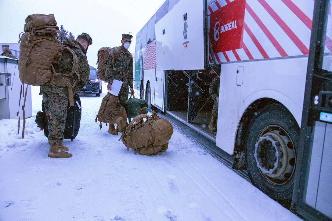 U.S. Marines with 2d Marine Expeditionary Brigade prepare to board the Italian Marine Militare ship, Garibaldi, in preparation for exercise Cold Response 2022, Narvik, Norway, March 7, 2022. Exercise Cold Response '22 is a biennial Norwegian national readiness and defense exercise that takes place across Norway, with participation from each of its military services, as well as from 26 additional North Atlantic Treaty Organization allied nations and regional partners. (U.S. Marine Corps photo by Staff Sgt. Shawn Coover)