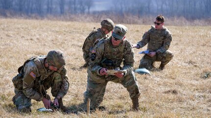 Indiana National Guard Spc. Kyle Lawson, of Company C, 2-134th Airborne, is graded during the mystery event emplacement and detonation of the M18A1 claymore as part of the Best Warrior Competition at Camp Atterbury, Indiana. He advanced to the regional competition scheduled later this year.