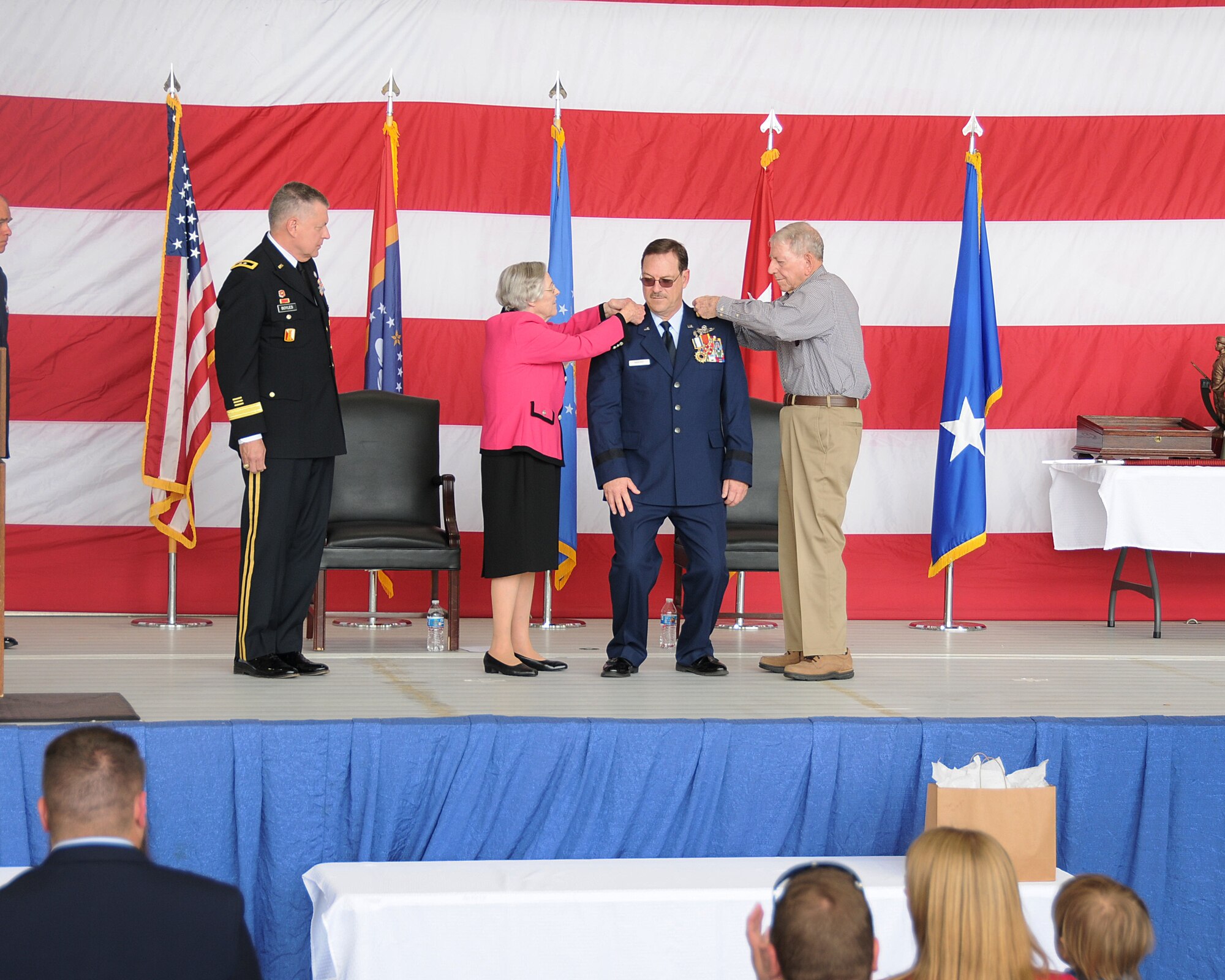 Billy and Marjorie Nabors pin the rank of Lieutenant General on their son, Billy M. Nabors, former Assistant Adjutant General and Commander, Mississippi Air National Guard, during his retirement ceremony, March 6, 2022, at Key Field Air National Guard Base,  Meridian, Mississippi.