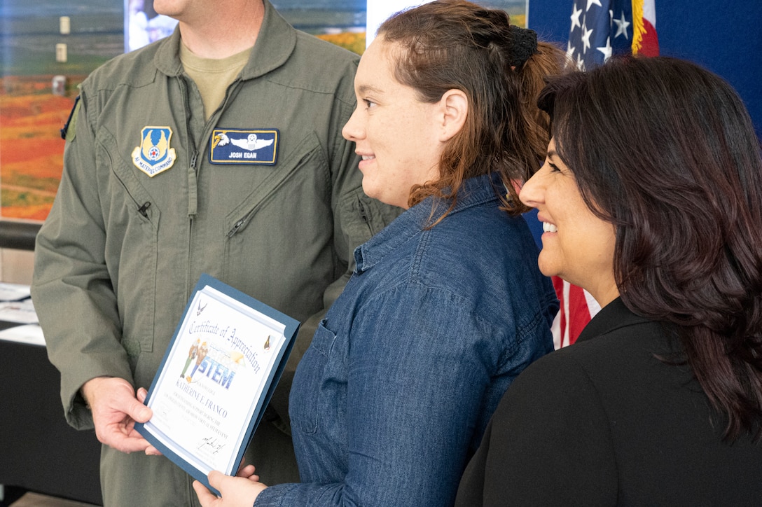 This year 53 STEM volunteers were invited. Col. Joshua Egan, Chief of Safety and Helida Vanhoy, STEM Coordinator awards the recipients with certificates.
