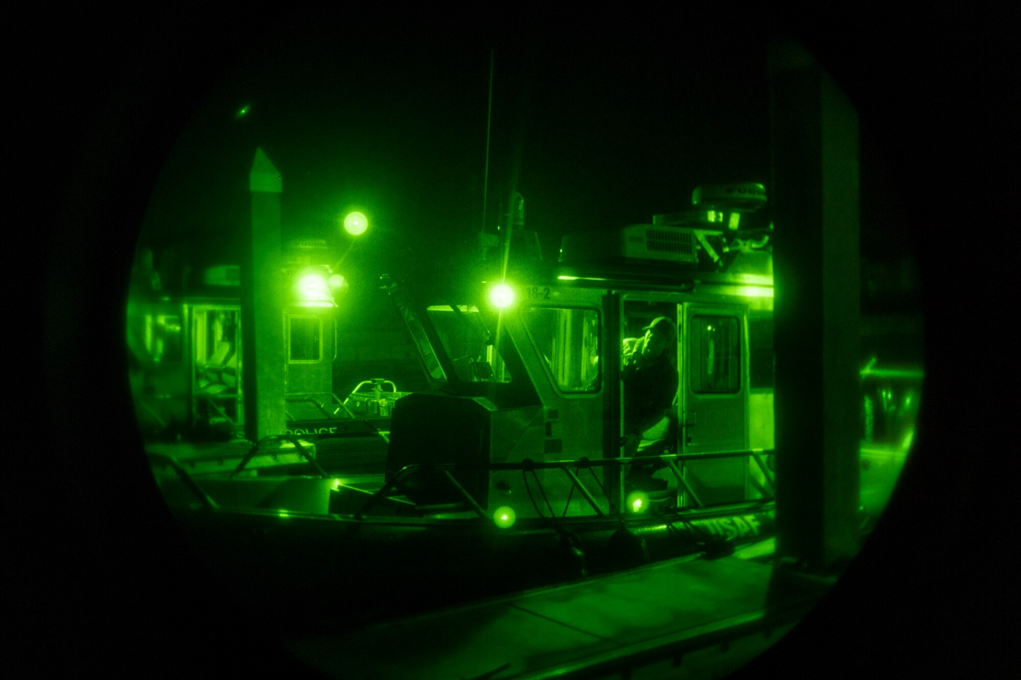 Marine patrolmen assigned to the 6th Security Forces Squadron inspect their patrol vessel at MacDill Air Force Base, Florida, March 7, 2022.