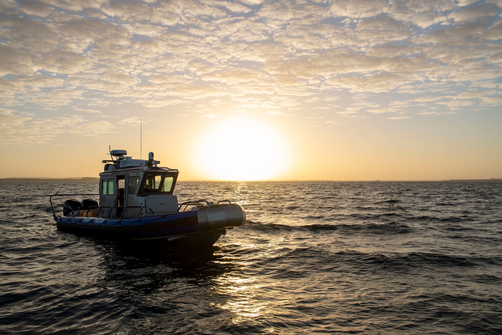 A 6th Security Forces Squadron marine patrol boat patrols the Coastal Restricted Area (CRA) surrounding MacDill Air Force Base, Florida, March 7, 2022.