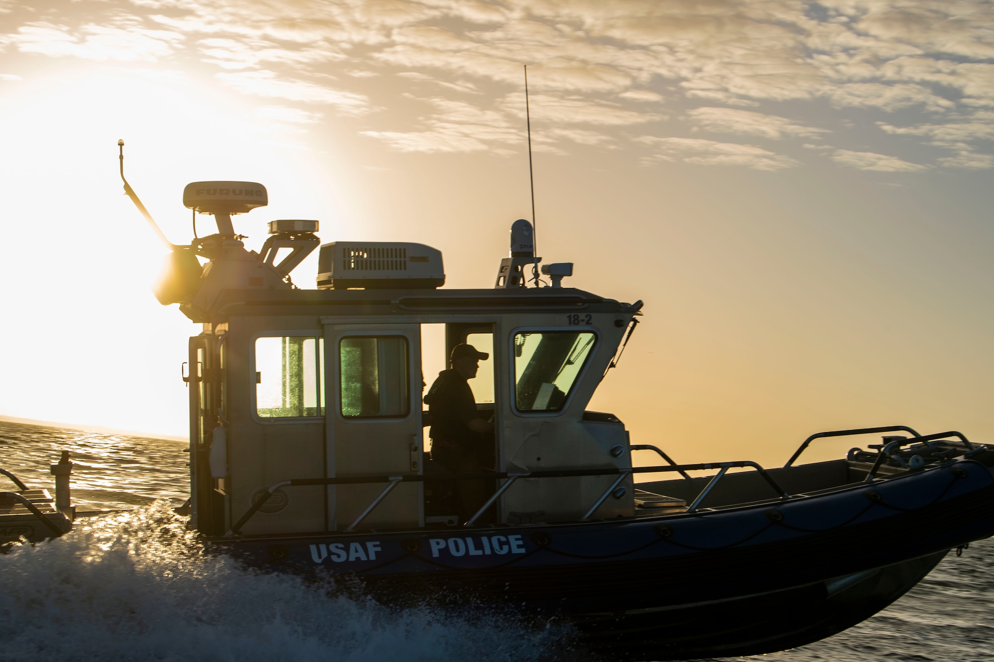 A 6th Security Forces Squadron marine patrol boat monitors the Coastal Restricted Area (CRA) surrounding MacDill Air Force Base, Florida, March 7, 2022.