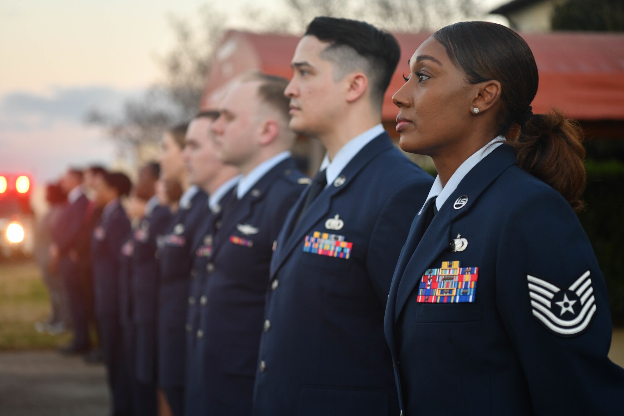 Airmen assigned to Maxwell-Gunter stand at parade rest awaiting the vice president’s departure from Maxwell Air Force Base, Alabama, March 6, 2022. Vice President Kamala Harris visited Alabama to commemorate the 57th anniversary of Bloody Sunday, a civil rights march that turned to tragedy. (U.S. Air Force photo by Senior Airman Jackson Manske)