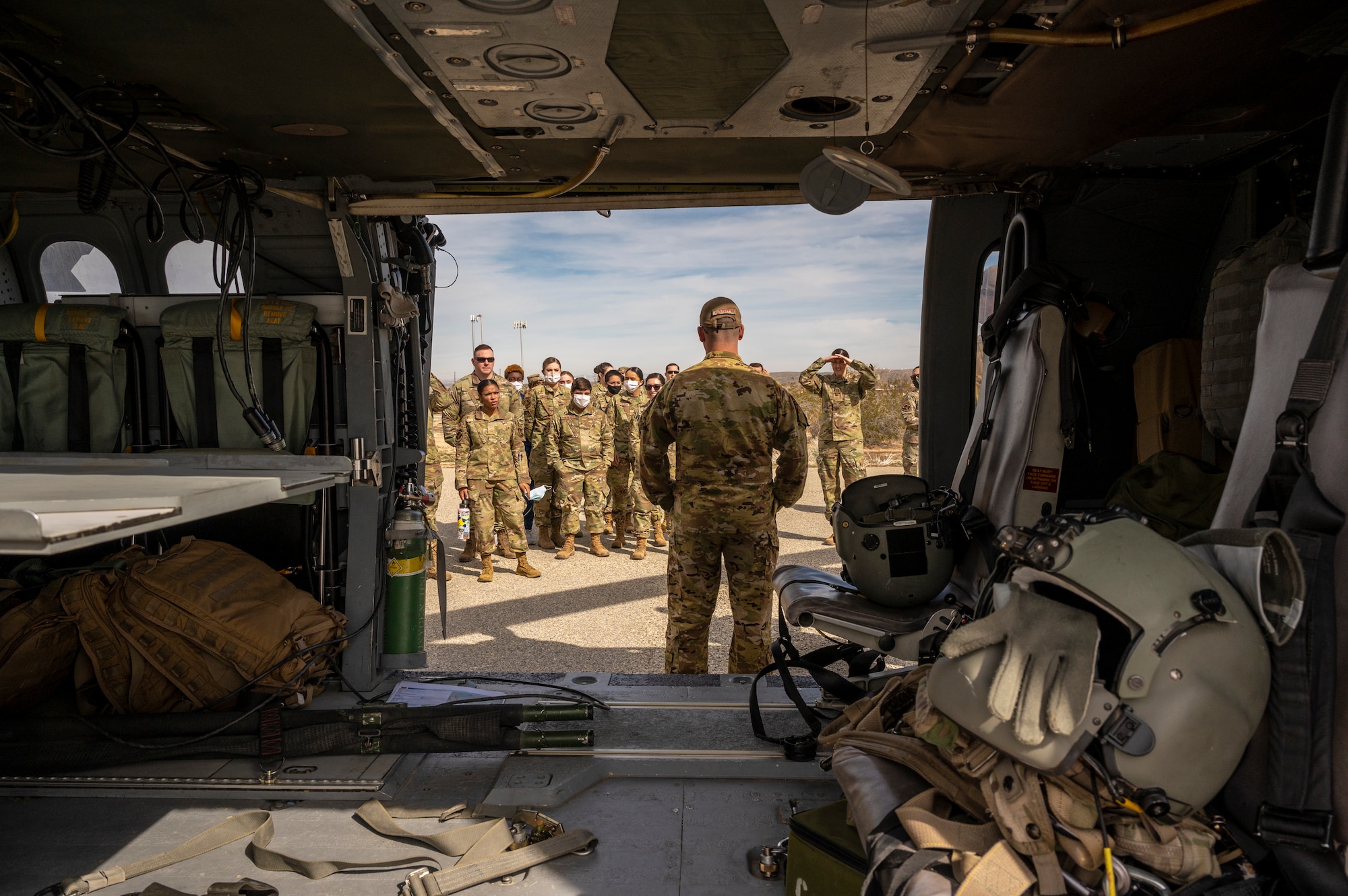 Flight paramedic Sgt. 1st Class Jason Hinrichs, Charlie Company, 2916th Aviation Battalion, 916th Support Brigade, conducts medevac training with Airmen from the 412th Medical Group at Edwards Air Force Base, California, March 3.  (Air Force photo by Katherine Franco)
