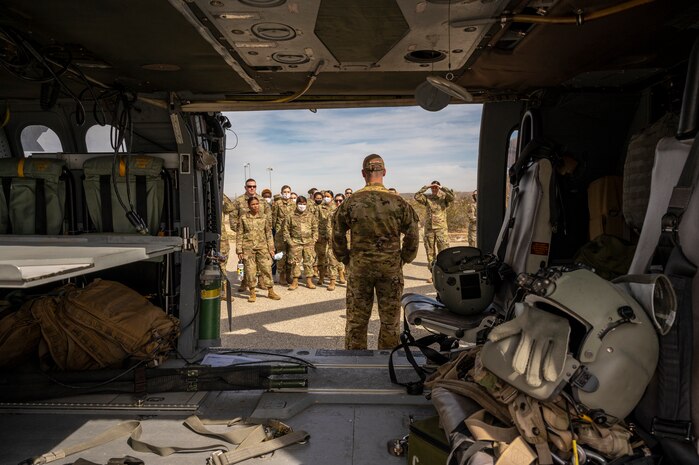 Soldiers from C Company, 2916th Aviation Battalion, 916th Support Brigade and Airmen from the 412th Medical Group, conduct medevac training at Edwards Air Force Base, California, March 3. (Air Force photo by Katherine Franco)