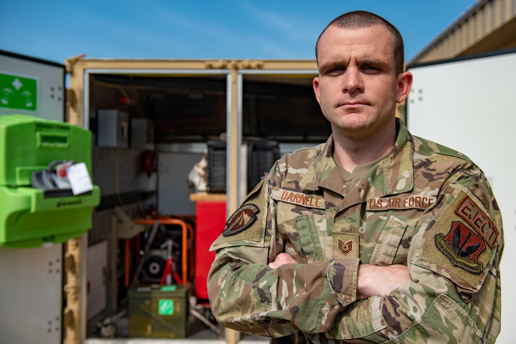 One of the creators of the mobile egress unit poses for a photo.