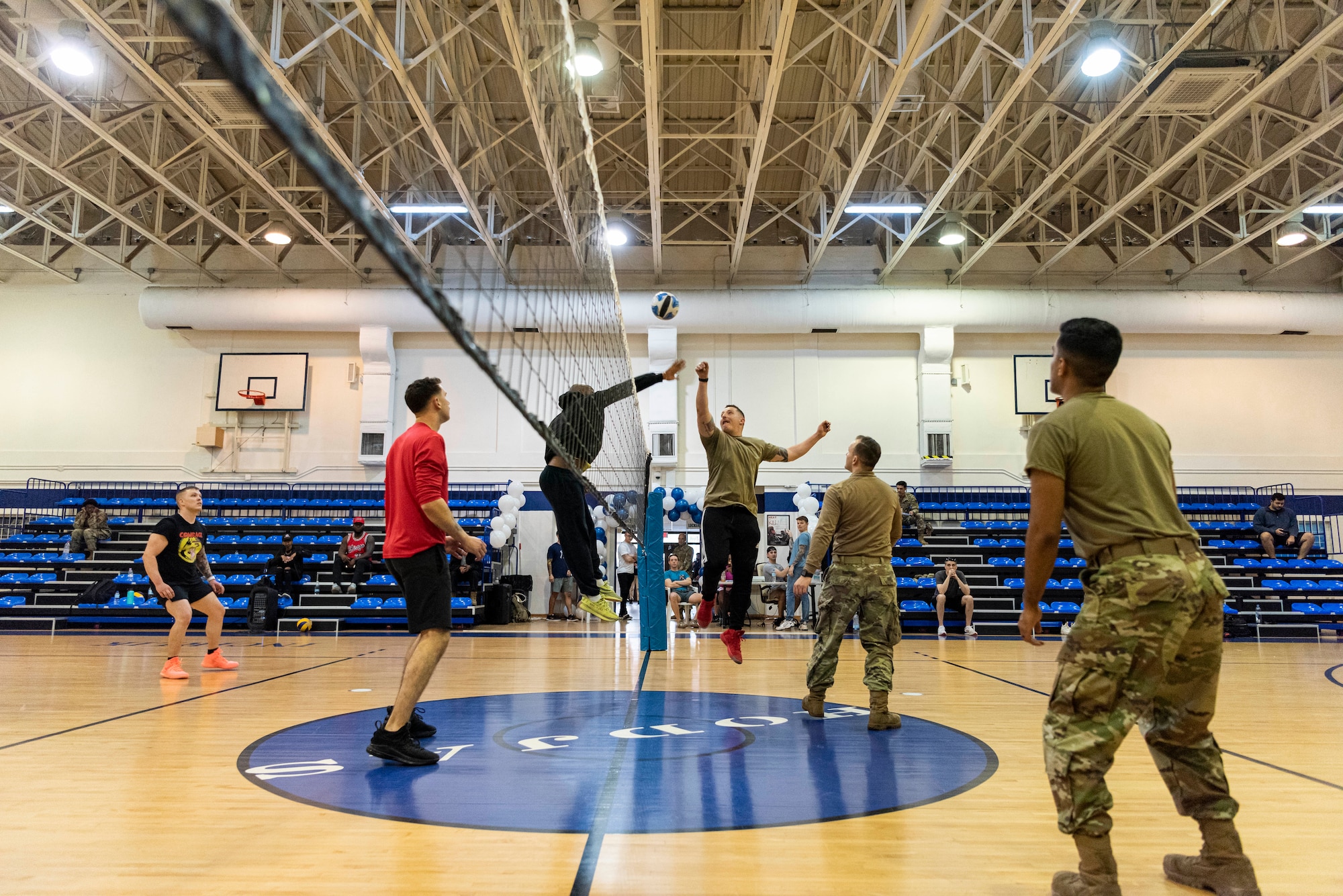 Airmen from across the 39th Air Base Wing participate in a volleyball tournament during the Air Force Assistance Fund kick-off event at Incirlik Air Base, Turkey, March 3, 2022. AFAF is a collection of four charities that combine their efforts to provide humanitarian assistance, educational support and financial aid to our Air Force family members in need.