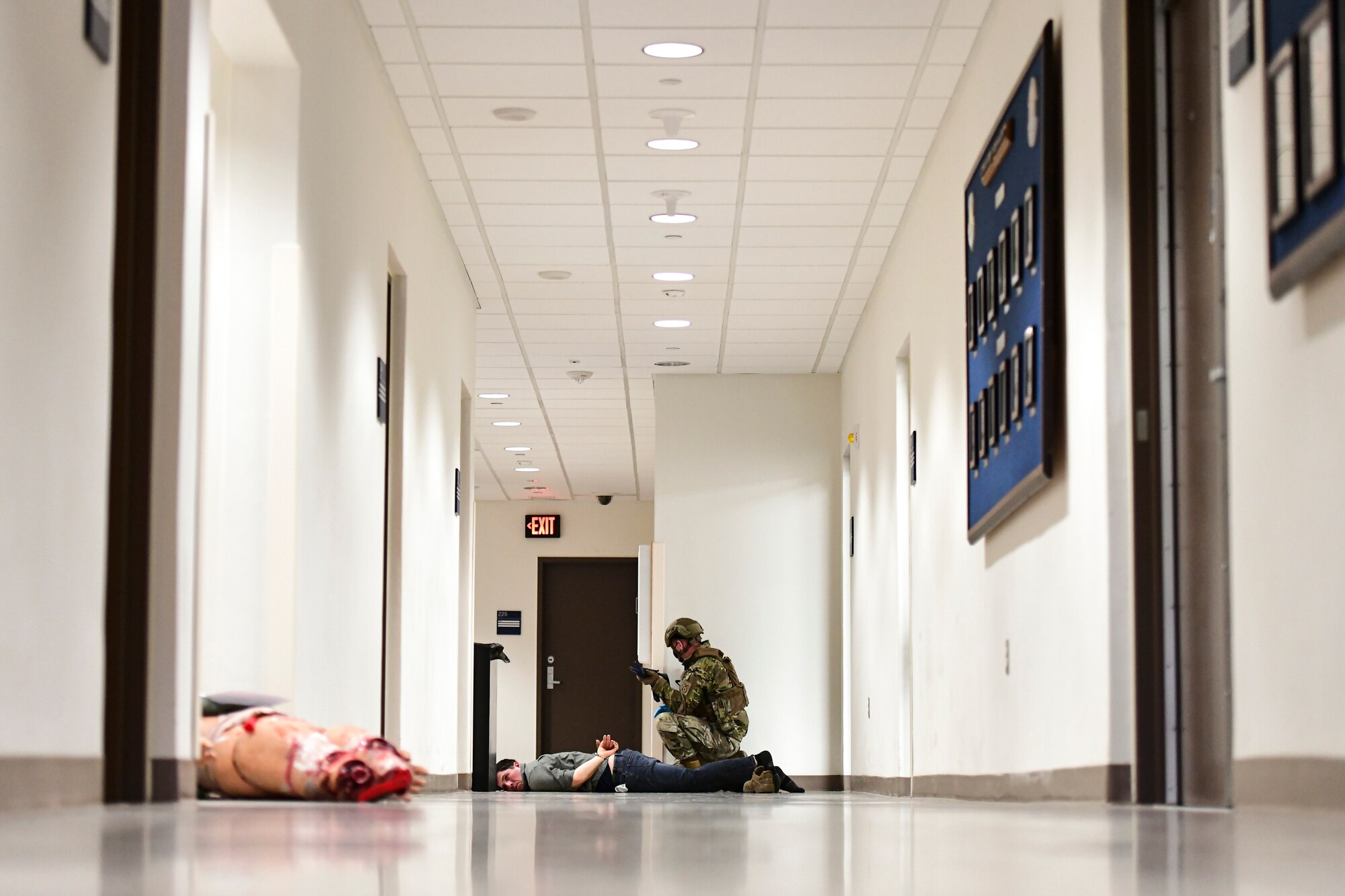 An Airman apprehends a simulated active shooter.
