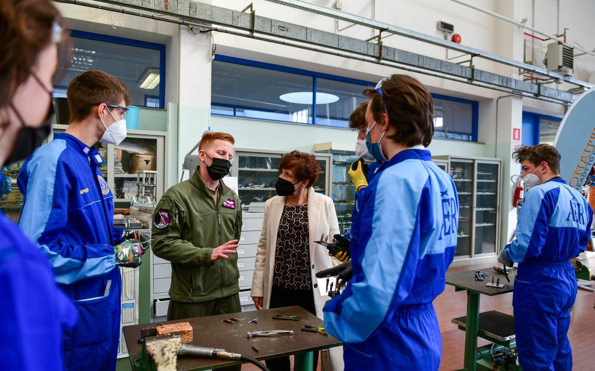 U.S. Air Force Capt. Ben Kern, 510th Fighter Squadron F-16 Fighting Falcon pilot, speaks to a group of aeronautical students at the Malignani Aeronautical Institute in Udine, Italy, March 3, 2022. Representatives from the 31st Fighter Wing and Col. Marco Schiattoni, Italian base commander, had the opportunity to share their career experiences with aeronautical high school students and engage with the future generation of pilots. (U.S. Air Force photo by Senior Airman Brooke Moeder)