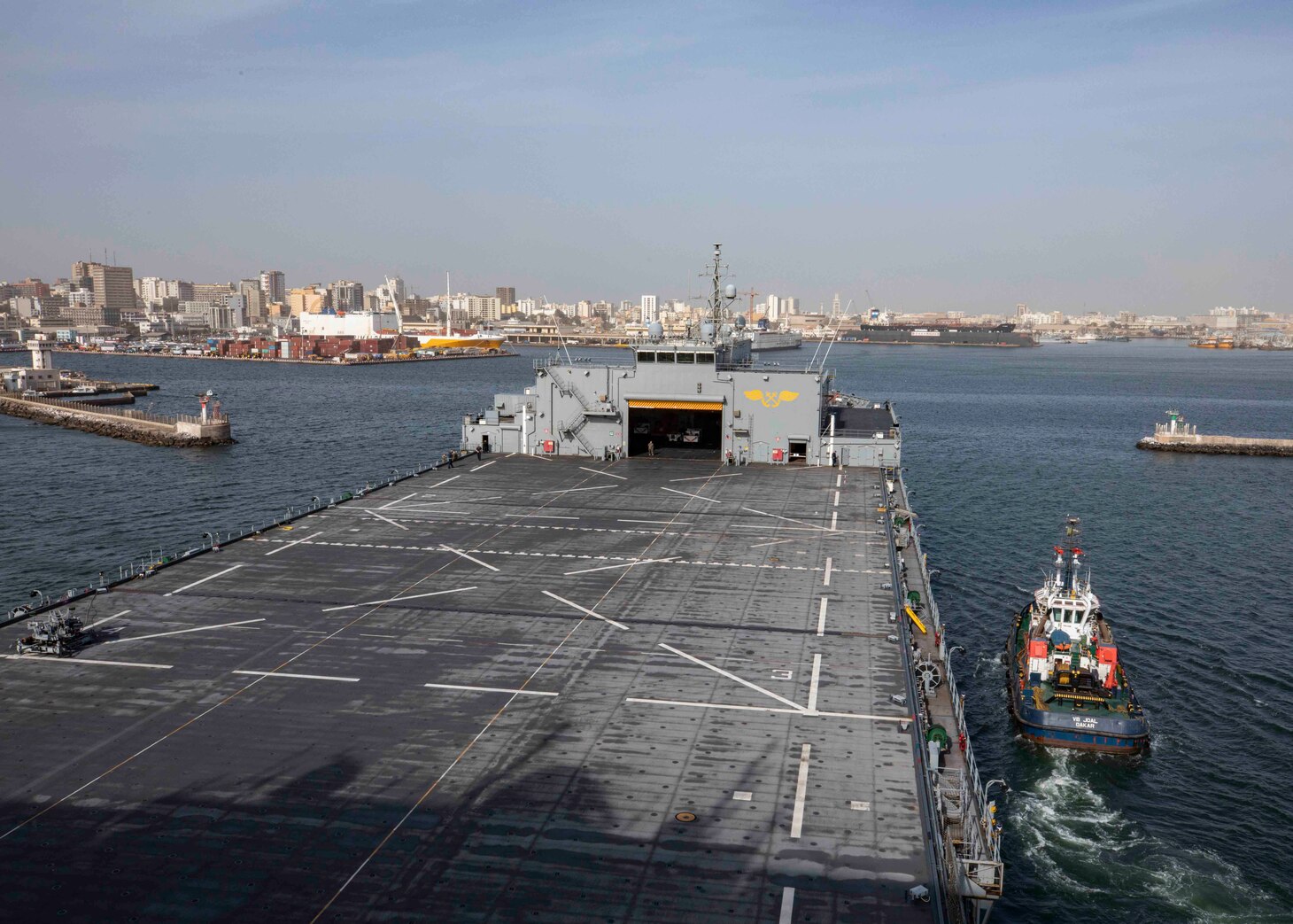 The Expeditionary Sea Base USS Hershel "Woody" Williams (ESB 4), enters the port of Dakar, Senegal, to participate in the multinational exercise Obangame Express, March 10, 2022.