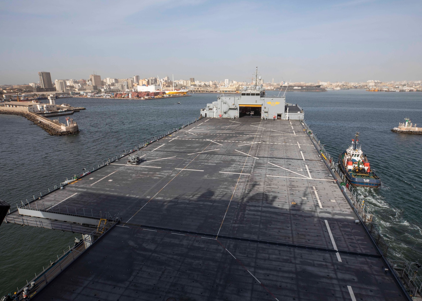 The Expeditionary Sea Base USS Hershel "Woody" Williams (ESB 4), enters the port of Dakar, Senegal, to participate in the multinational exercise Obangame Express, March 10, 2022.