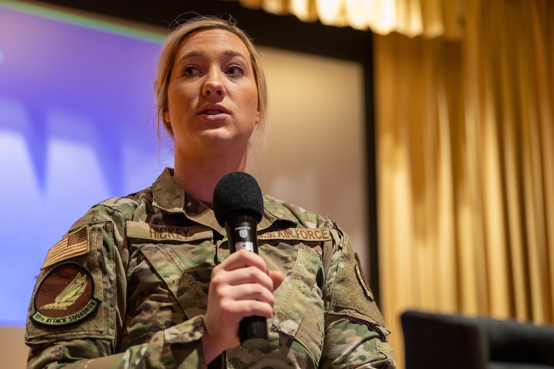 1st. Lt. Alexis Hickey, 89th Attack Squadron chief of the MQ-9 mission planning cell, emcees at the first ever Women’s Conference at Ellsworth Air Force Base, S.D., March 2, 2022.