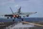 An EA-18G Growler, assigned to the "Wizards" of Electronic Attack Squadron (VAQ) 133, launches from the flight deck of the Nimitz-class aircraft carrier USS Abraham Lincoln (CVN 72).