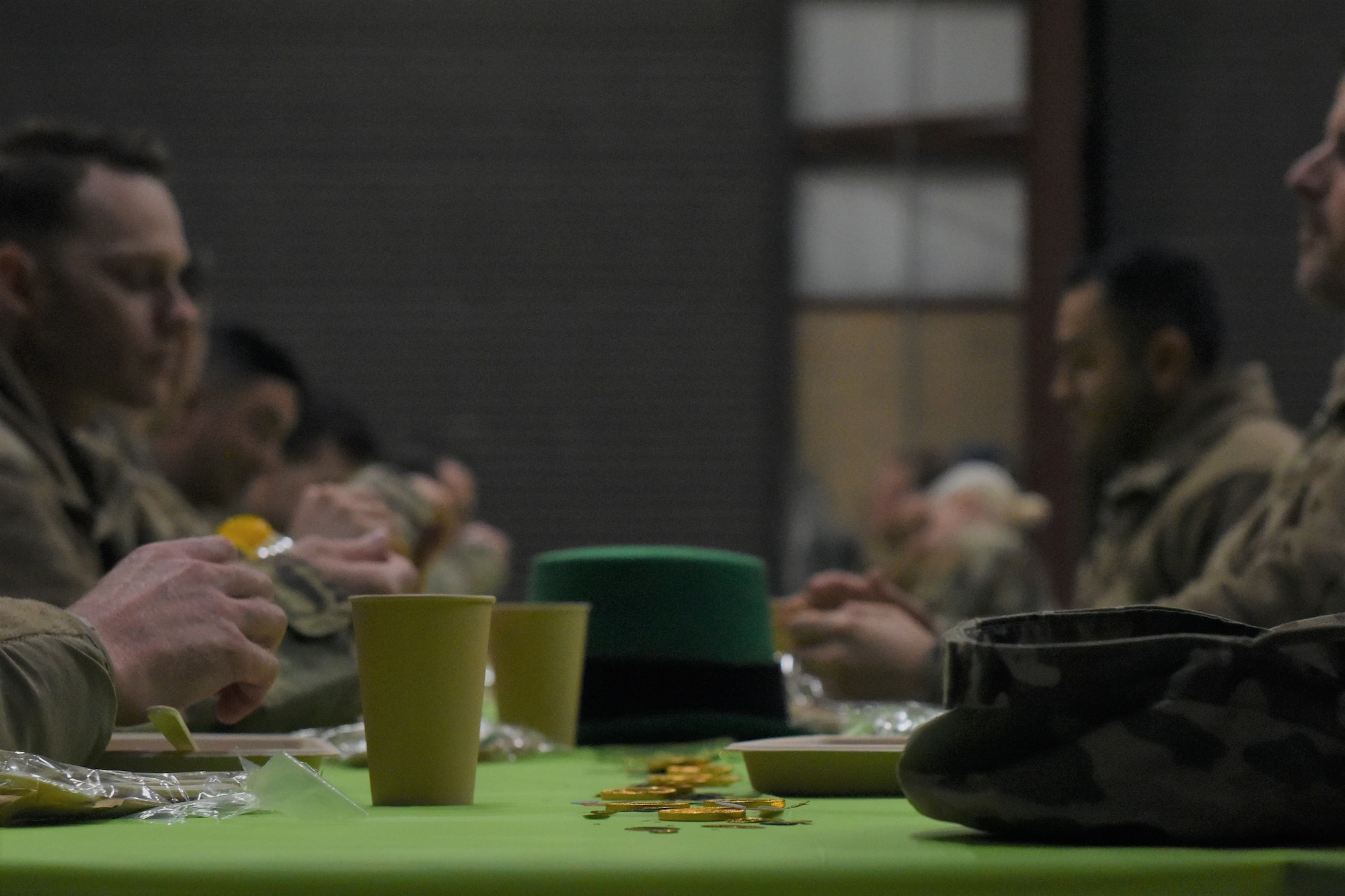 Airmen from the 419th Fighter Wing sit down to eat a meal prepared as part of the 2022 John L. Hennessy Award competition