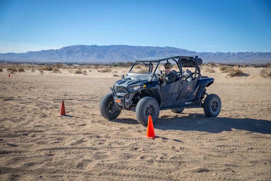 U.S. Marine Corps Sgt. Maj. Troy E. Black, the 19th Sergeant Major of the Marine Corps, participates in a Polaris Razor all-terrain vehicle licensing course at Marine Corps Air Ground Combat Center, Twentynine Palms, California, March 2, 2022. The Sergeant Major of the Marine Corps attended the Polaris Razor licensing course to maximize freedom of movement in the training areas surrounding the station. The course is designed to introduce Marines to the all-terrain vehicle, and familiarize them to its capabilities and safety considerations. (U.S. Marine Corps photo by Staff Sgt. Victoria Ross)