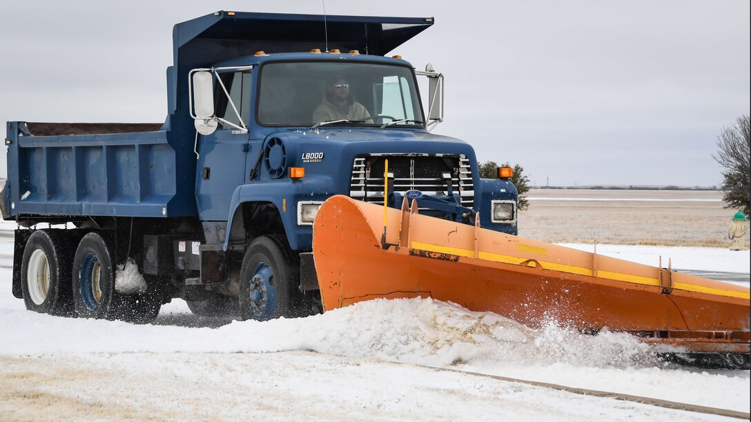 Snow plow clears Bridwell Road on Sheppard AFB