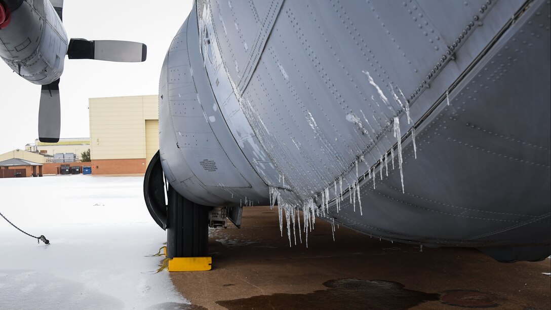Ice hangs from C-130 ground instructional training aircraft
