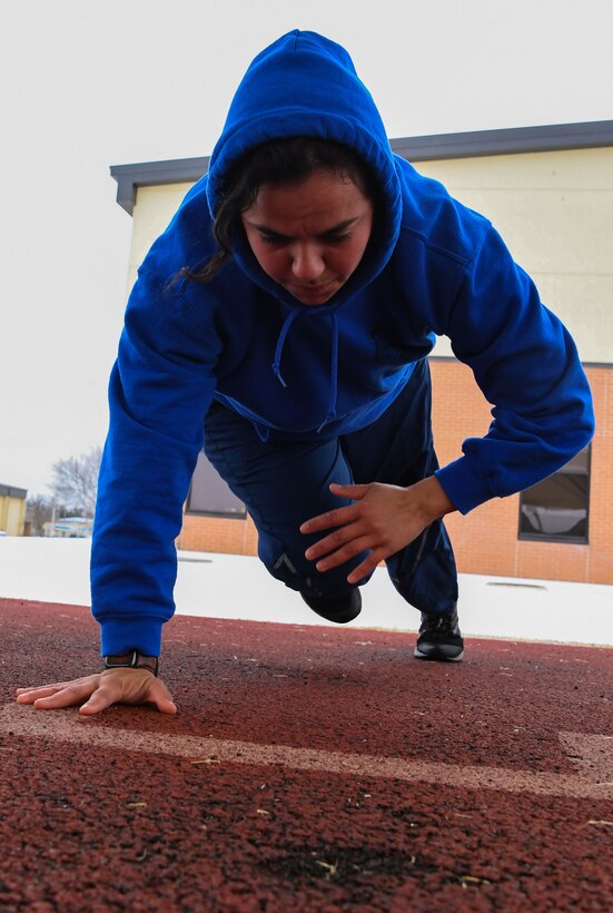 Airman works out during winter weather event February 24, 2022