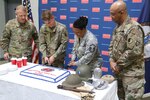Cake cutting ceremony recognizes 410th birthday of Va. National Guard, Jamestown