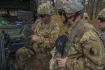 1-111th learn new howitzer systems from 82nd Airborne DIVARTY