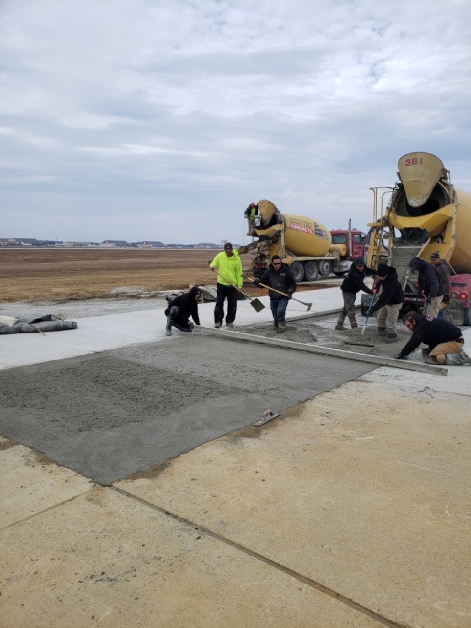The 316th Civil Engineer Squadron provides final touches on a 6-month long taxiway repair at Joint Base Andrews, Dec. 3, 2021.