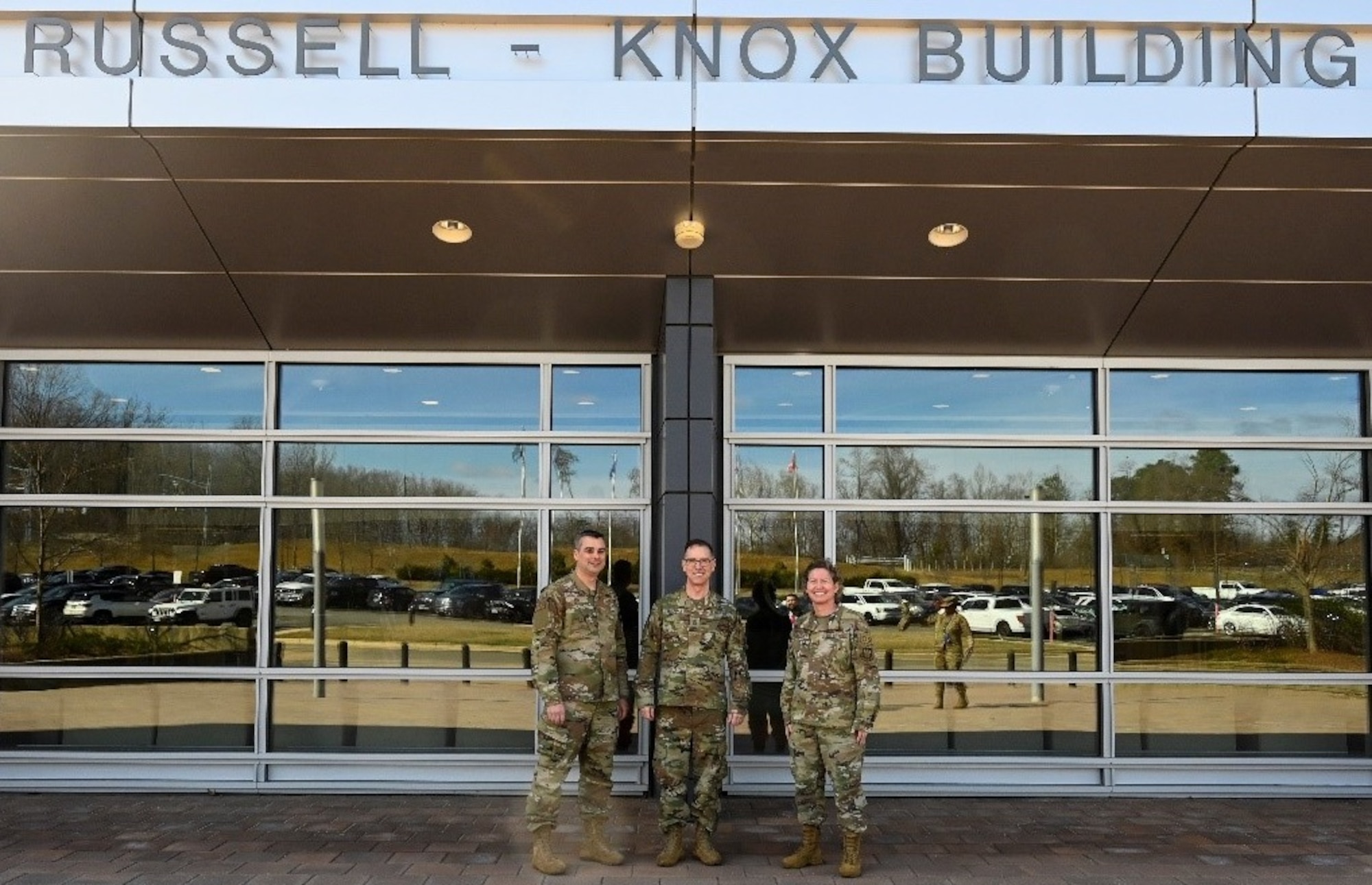 Chief Master Sgt. of the Space Force, Roger A. Towberman, center, pauses with Chief Master Sgt. Gregory Gow, Office of Special Investigations Command Chief, and Col. Amy Bumgarner, OSI Vice Commander, in front of the Russel-Knox Building, Quantico, Va., March 8, 2022. The CMSSF visited OSI headquarters and received briefings on the OSI missions and how OSI interacts and supports the Space Force. (U.S. Air Force photo by Staff Sgt. Joshua King)