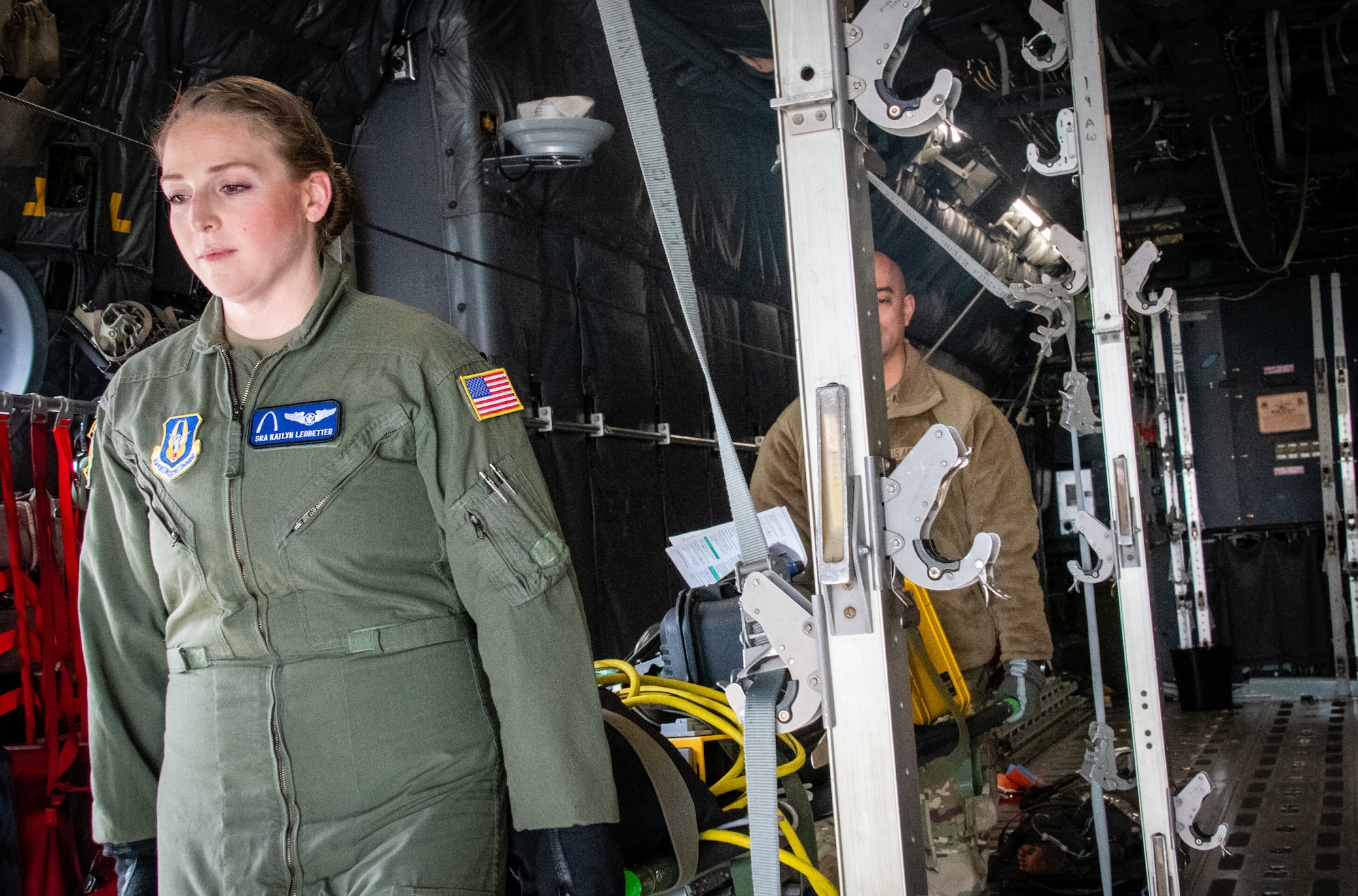 Senior Airman Katlyn Ledbetter and Master Sgt. Jose Gomez, Jr., 932nd Aeromedical Evacuation Squadron flight medics, practice offloading medical equipment from a C-130 Hercules AE fuselage trainer (FuT) as part of their regular AE training regimen.