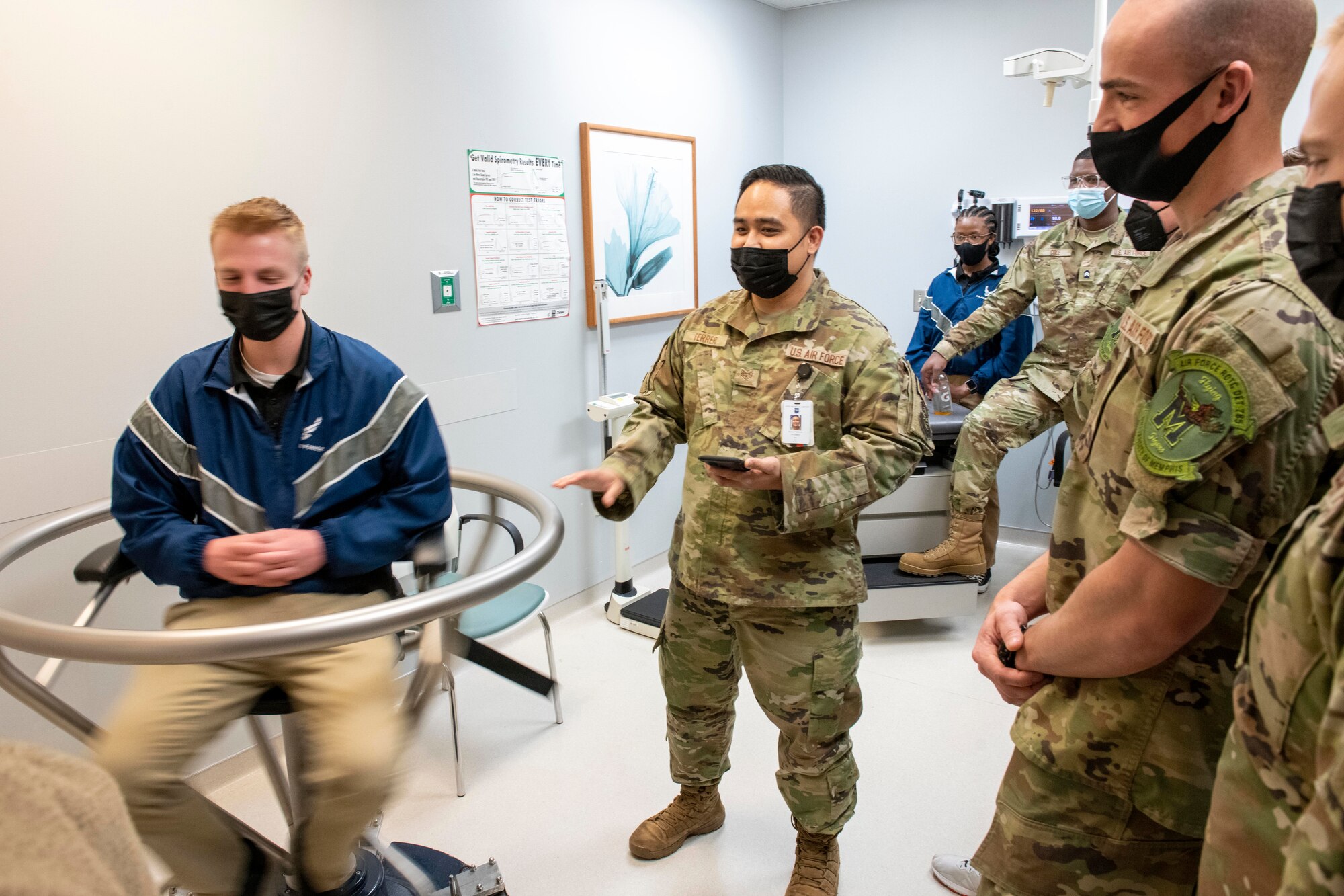 An Air Force Reserve Officer Training Corps cadet from the University of Memphis Detachment 785 spins in a Barany chair during a tour of the 19th Medical Group