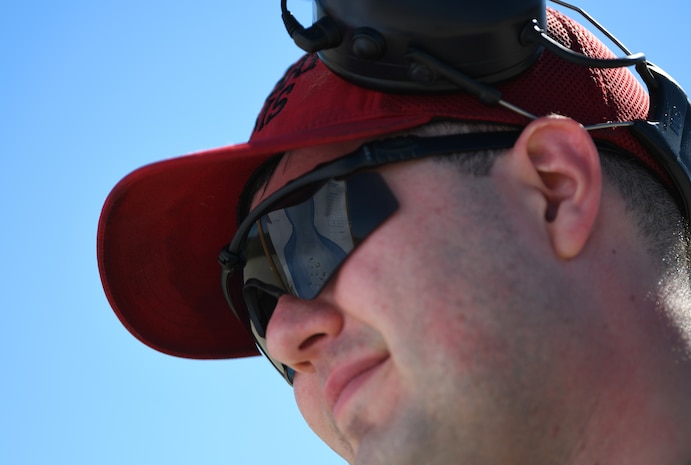 Staff Sgt. Keith Talbot, 9th Security Forces Squadron combat arms instructor evaluates a target Feb. 28, 2022, at Beale Air Force Base, California.