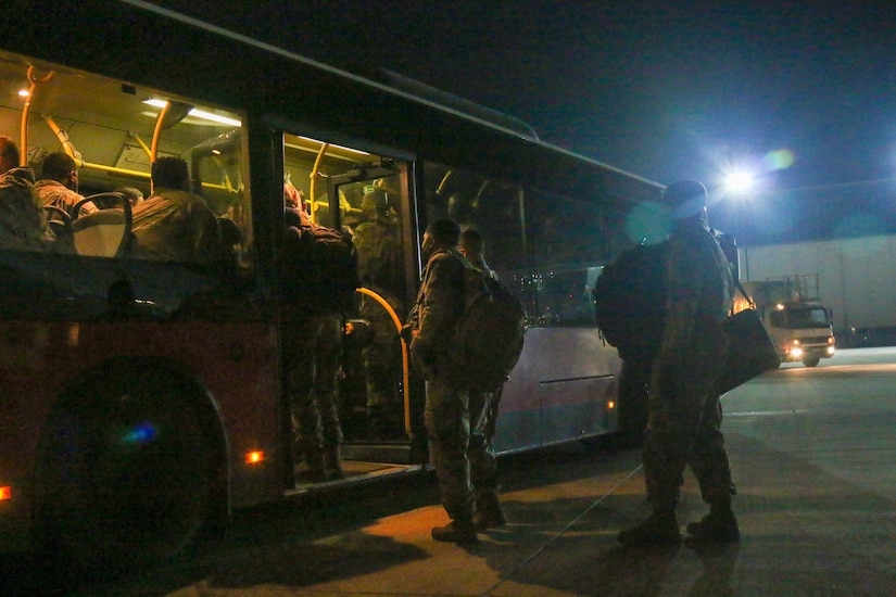 Soldiers arrive by bus