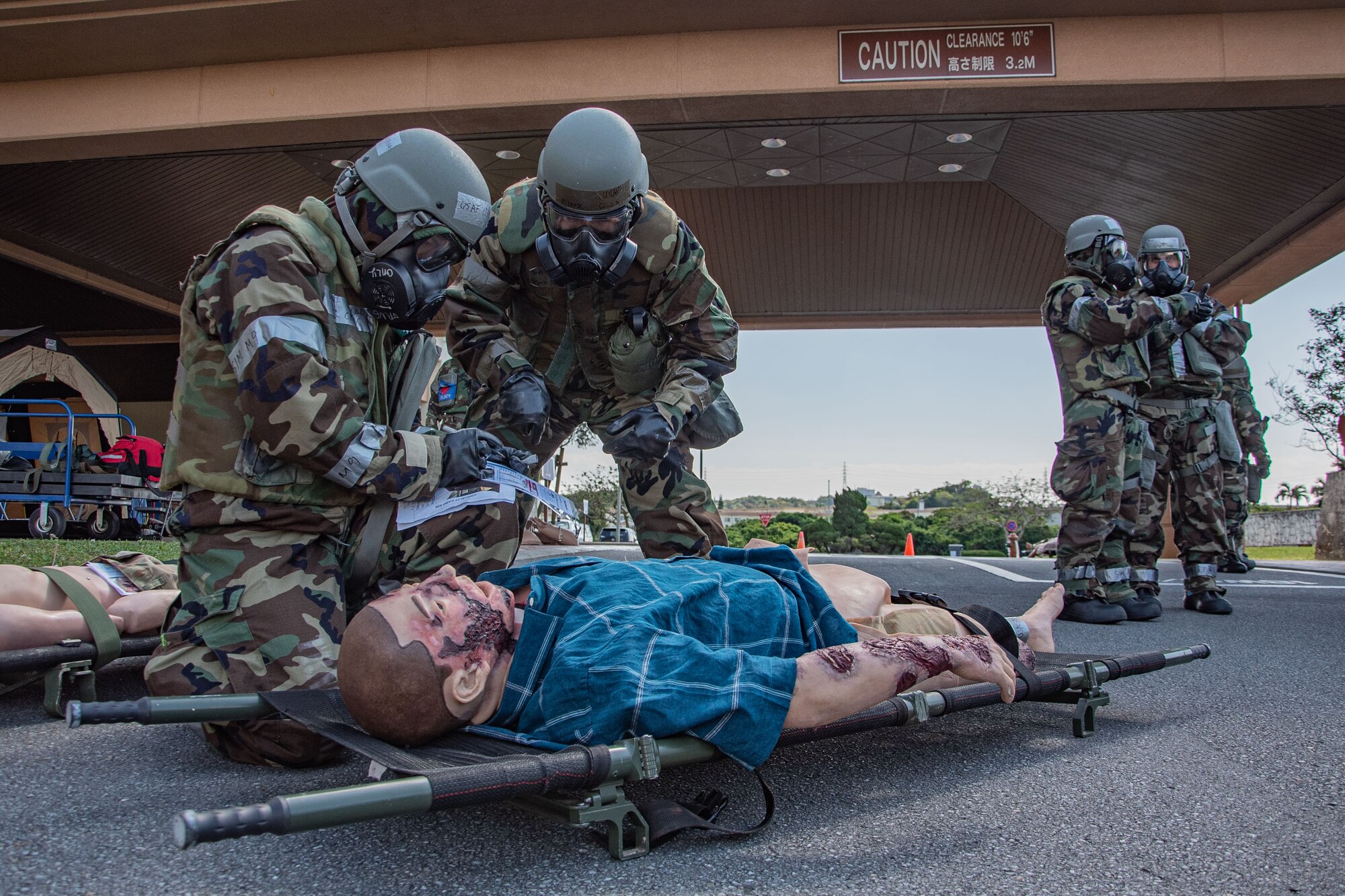 Airmen tend to a fake patient.