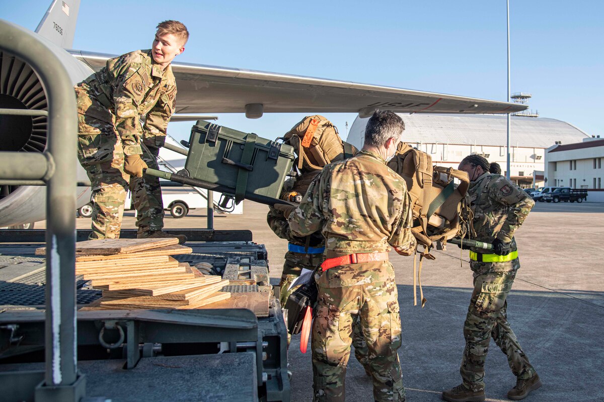 Members of Brooke Army Medical Center unload medical equipment off a KC-46 Pegasus transport aircraft during Ultimate Caduceus 22 Mar 1, 2022 at Kelly Air Field. Ultimate Caduceus is an annual patient movement exercise which assesses the capabilities of and provides field training to aeromedical evacuation teams, critical care air transport teams, medical staging functions and reception and onward movement functions for global patient movement.