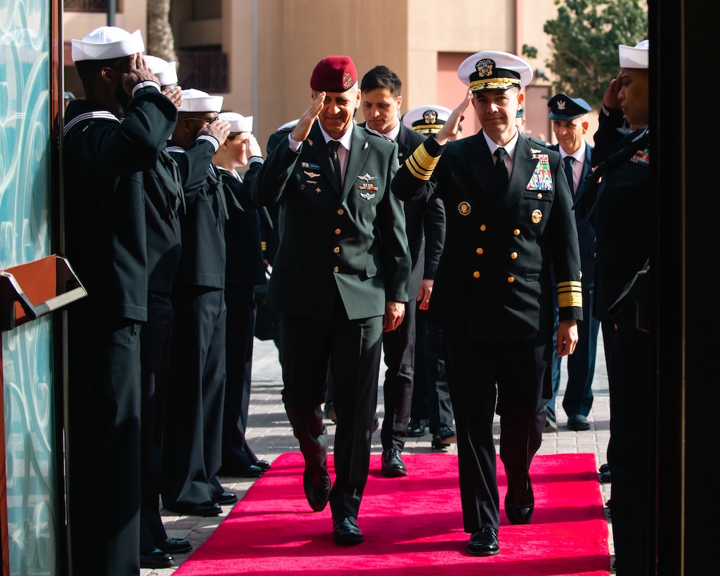 220310-N-KZ419-1049 NAVAL SUPPORT ACTIVITY BAHRAIN (March 10, 2022) Vice Adm. Brad Cooper commander of U.S. Naval Forces Central Command (NAVCENT), U.S. 5th Fleet and Combined Maritime Forces, right, and Israel’s Chief of the General Staff Lt. Gen. Aviv Kohavi, salute sideboys as they enter NAVCENT headquarters, March 10. (U.S. Navy photo by Mass Communication Specialist 2nd Class Dawson Roth)