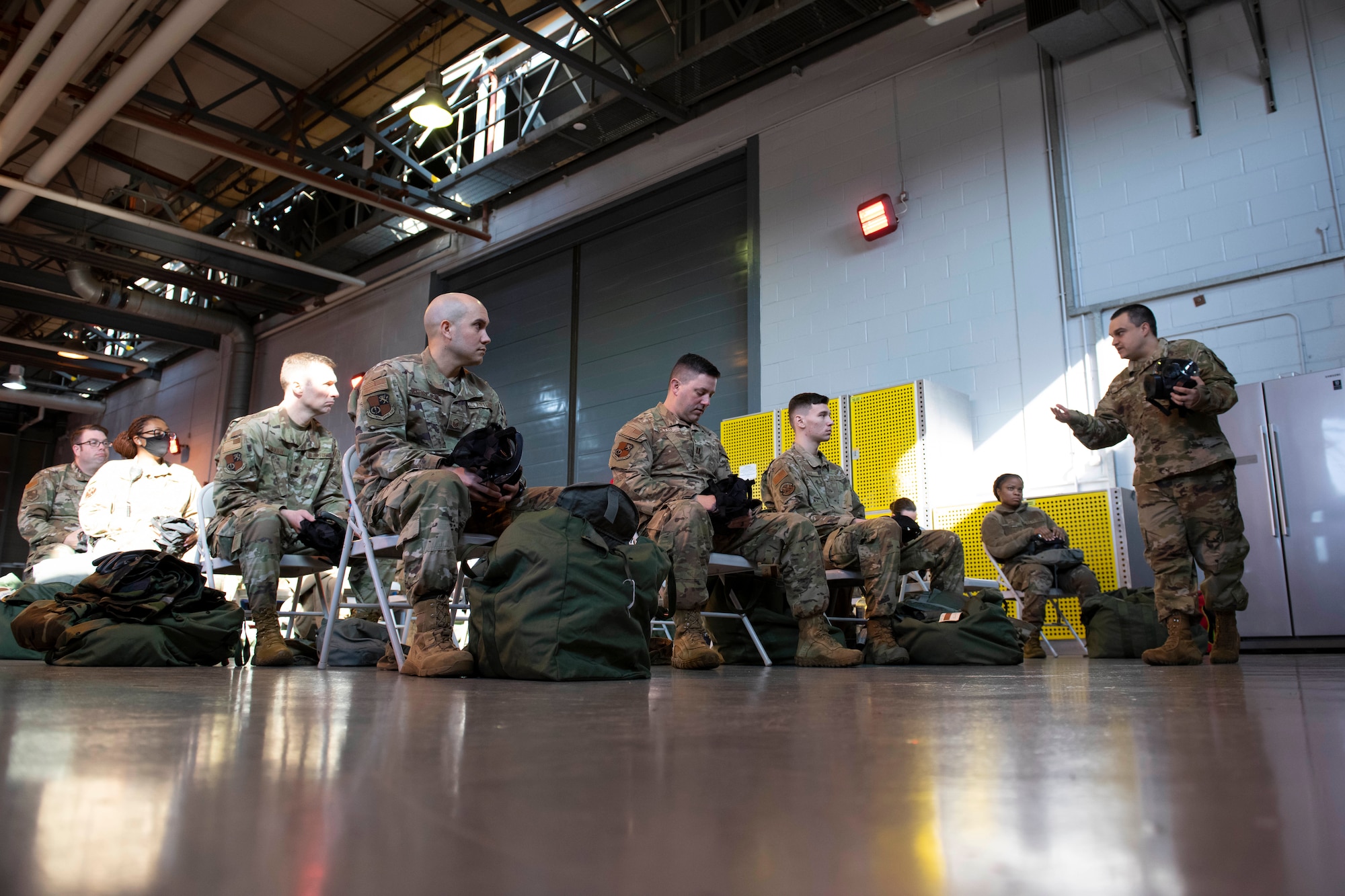 U.S. Air Force Staff Sgt. Nathan Hoskins, 423rd Civil Engineer Squadron NCO in charge of training, instructs a chemical, biological, radiological and nuclear (CBRN) defense survival skills course at RAF Alconbury, England, March 8, 2022. The course consists of individual knowledge-based and demonstration performance objectives that provide an in-depth education on CBRN defense hazards and protective actions. (U.S. Air Force photo by Senior Airman Jennifer Zima)