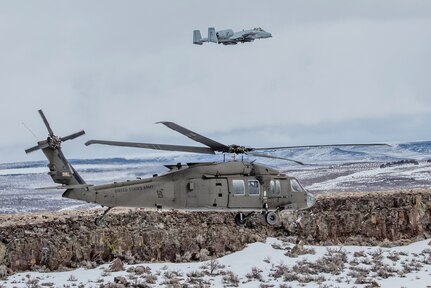 Idaho Army and Air National Guard aviation units conducted combat search and rescue and escort training together March 9, 2022, over Idaho’s Owyhee Mountains. The training rescue missions involved 124th Fighter Wing A-10 Thunderbolt II pilots escorting UH-60 Black Hawk pilots along the safest route of a simulated combat zone.