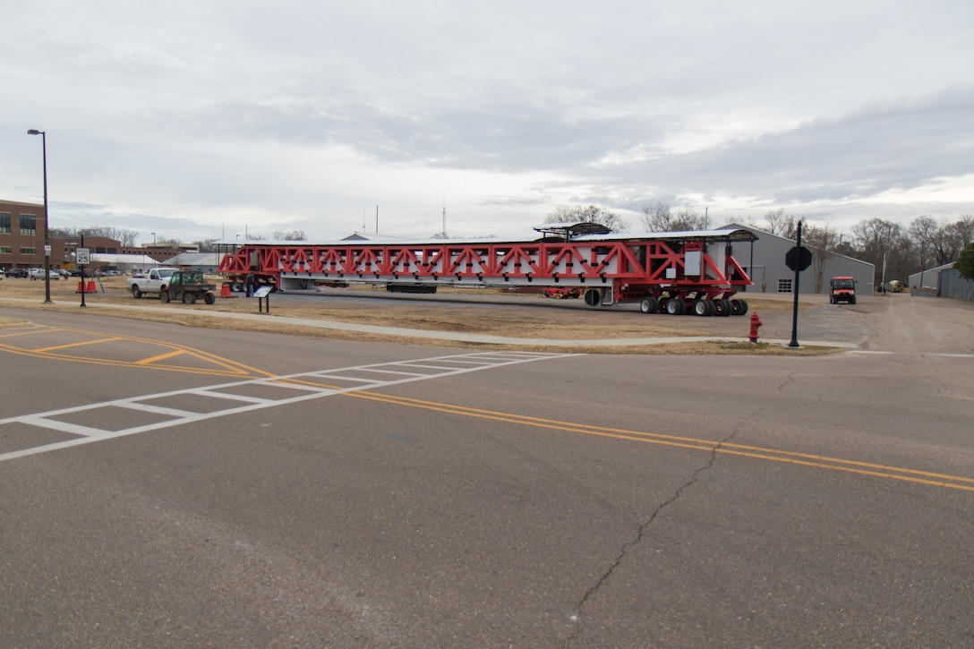 On Jan. 31, 2022, crews at the U.S. Army Engineer Research and Development Center (ERDC) in Vicksburg, Miss., prepare to move the HVS “Titan” to its new, permanent testing location at the Geotechnical and Structures Laboratory. The Titan is a critical research tool used to evaluate new materials, design methods and construction techniques that can help optimize new infrastructure facilities. (U.S. Army Corps of Engineers photo)