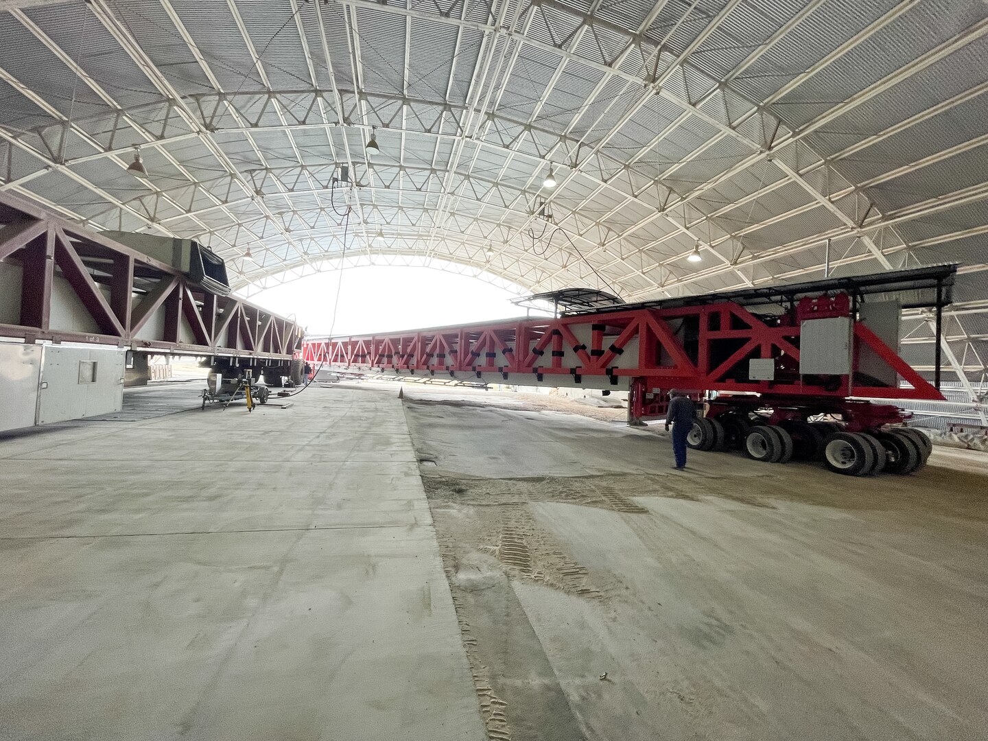 The U.S. Army Engineer Research and Development Center recently completed the new HVS Titan, which has a total travel span of 75 feet and is capable of applying over 18,000 simulated vehicle passes per day, providing the ability to perform multiple pavement tests simultaneously and maximizing testing efficiency. The Titan is a critical research tool used to evaluate new materials, design methods and construction techniques that can help optimize new infrastructure facilities. (U.S. Army Corps of Engineers photo)