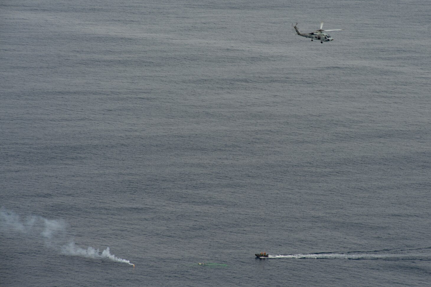 TOKYO BAY (March 10, 2022) A small boat team from Japan Maritime Self-Defense Force (JMSDF) Utility Landing Ship JS Yusotei 2-go (LCU 2002) retrieve a torpedo following the first torpedo exercise conducted by a U.S. Navy squadron alongside the JMSDF. HSM-77 is attached to Commander, Task Force 70 and forward-deployed to the U.S. 7th Fleet area of operations in support of a free and open Indo-Pacific. (U.S. Navy photo by Mass Communication Specialist 2nd Class Askia Collins)